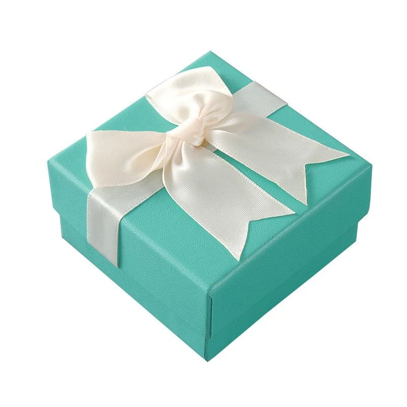 Überraschungsbox mit fliegenden Schmetterlingen